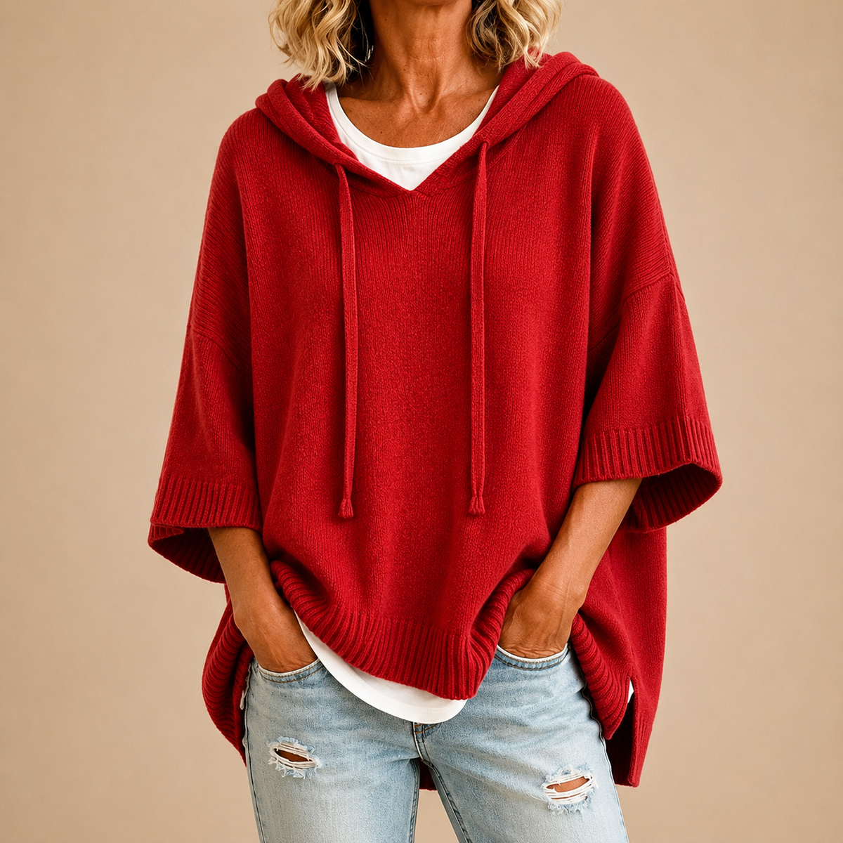 Poncho aus Strick mit Kapuze